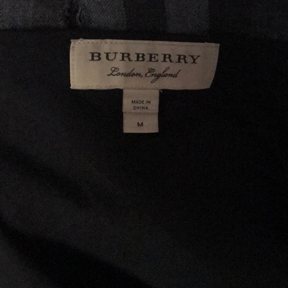 This a authentic Burberry fleeced hoodie all black